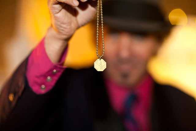 Longtime New Yorker King Coyote sells handcrafted necklaces made from old NYC tokens ranging from the subways to the peep shows and beyond.